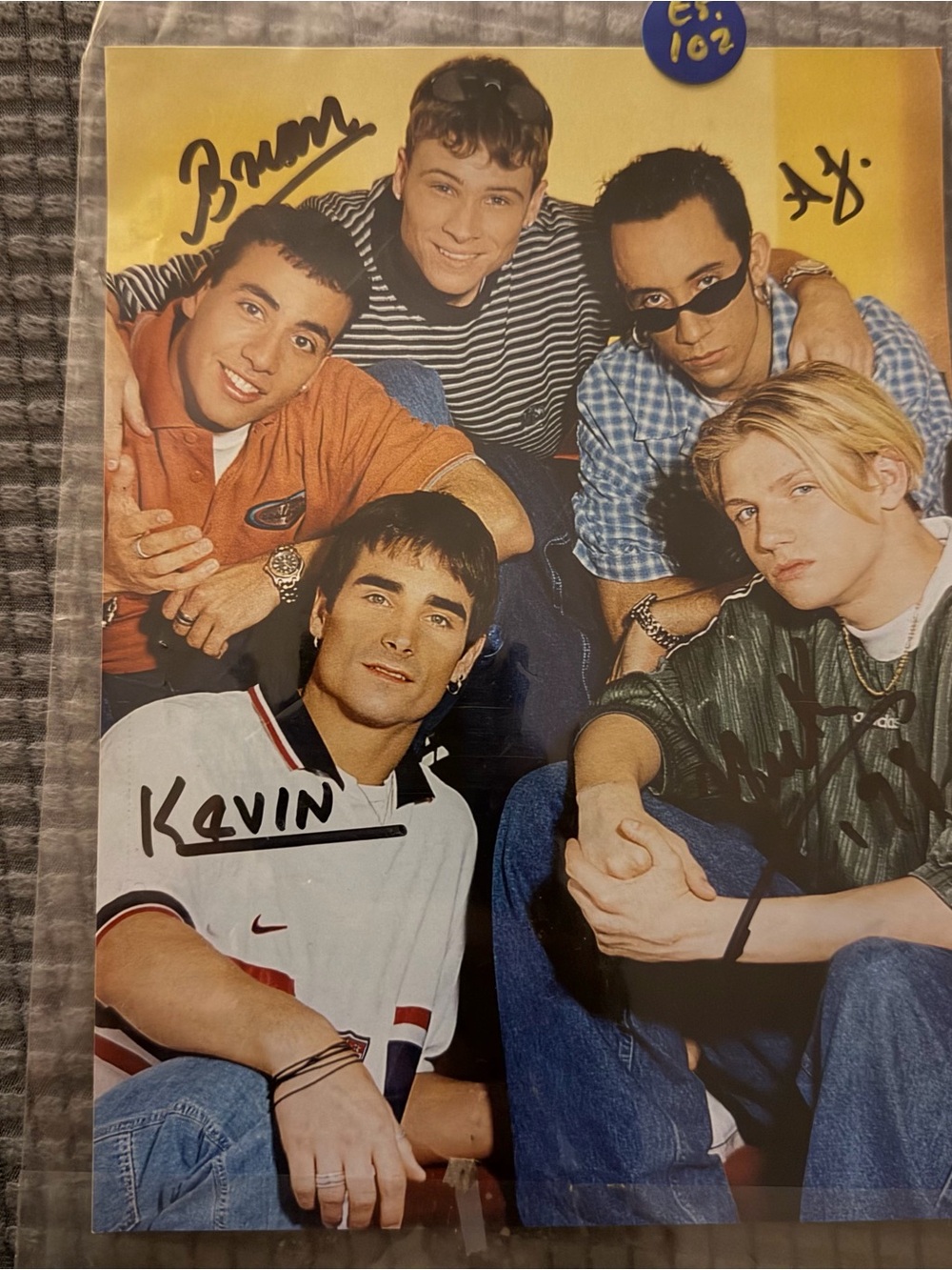 Backstreet Boys Boy Band Photo with Yellow Backdrop and Multi-Color Outfits